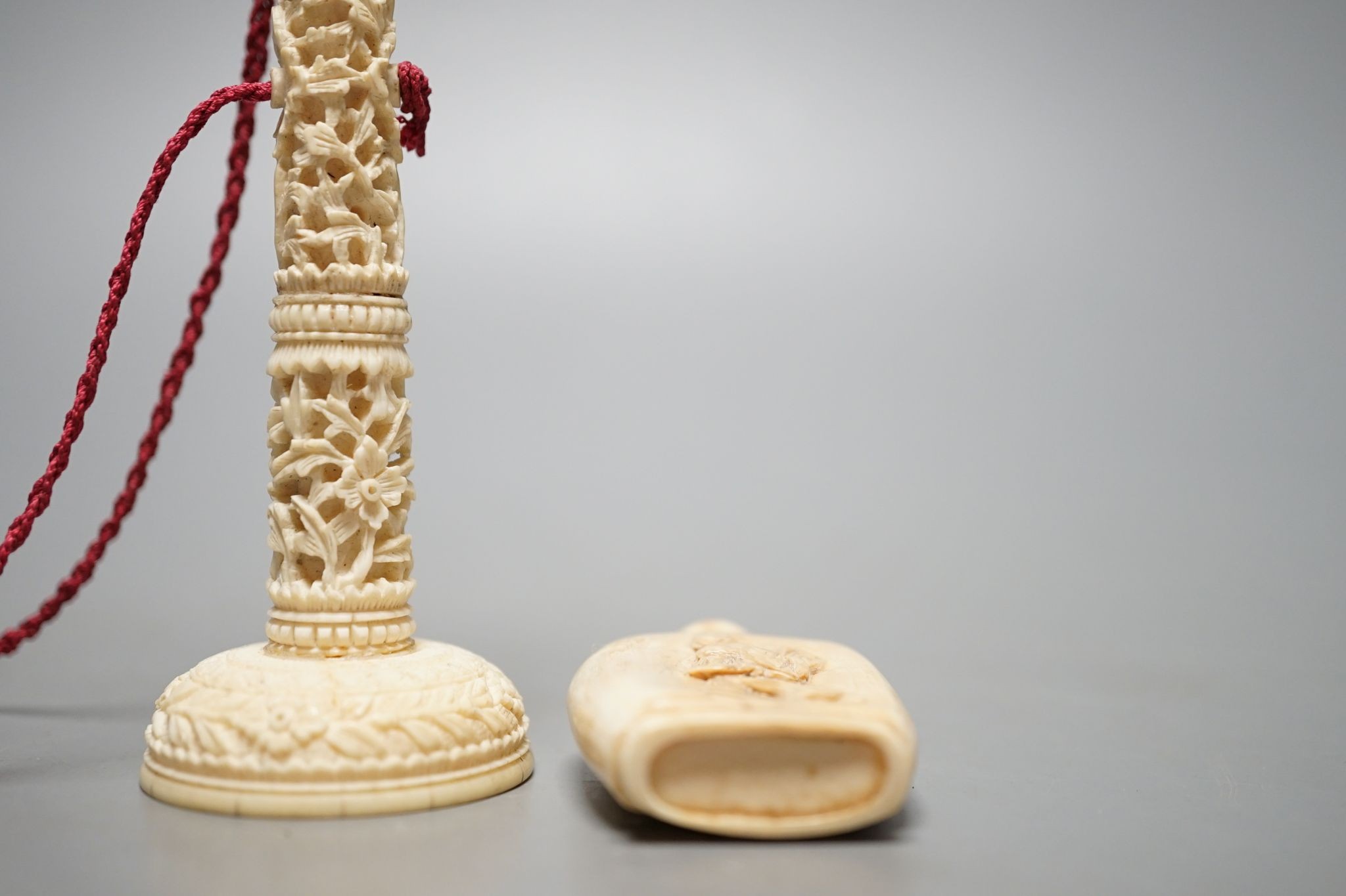 A Chinese export ivory spike and ball game, 16.5cm, and an ivory snuff bottle